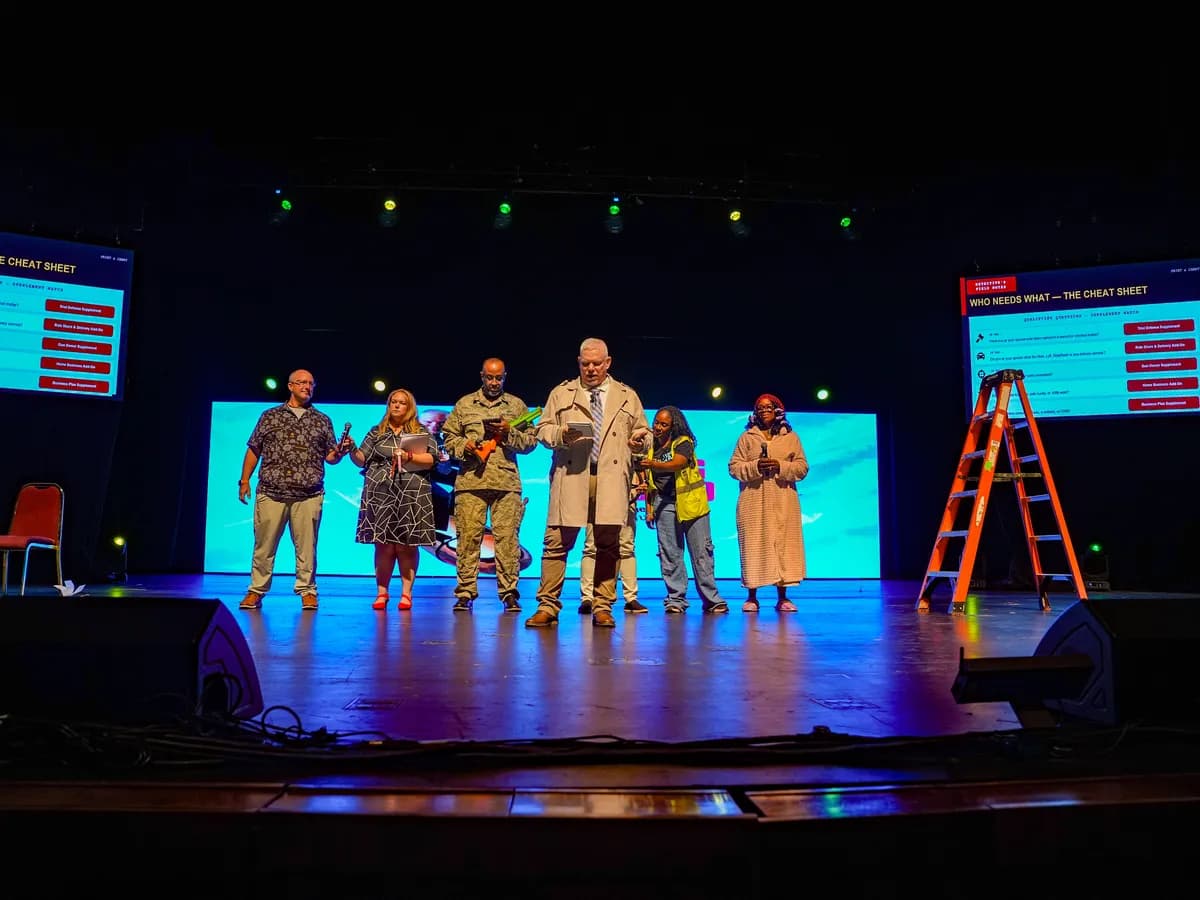 A group on stage together during a celebration